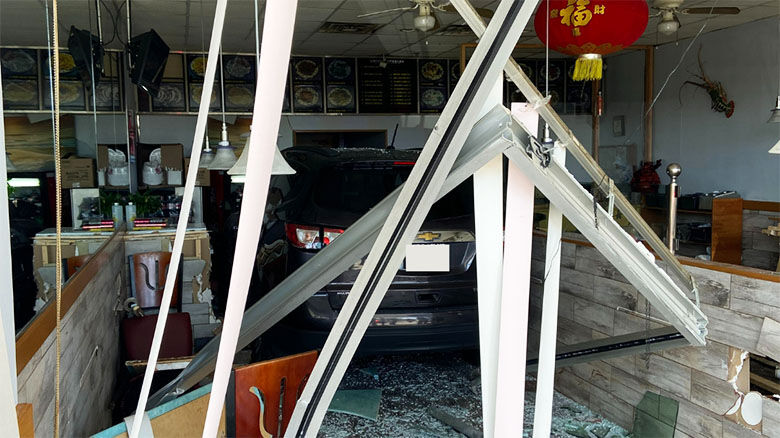 A woman driving this SUV crashed through the front of Happy Wok on Vogel Road in Arnold.